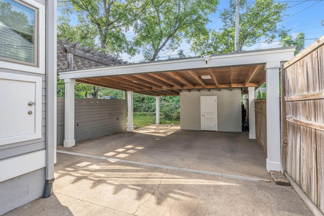 view of parking with a carport