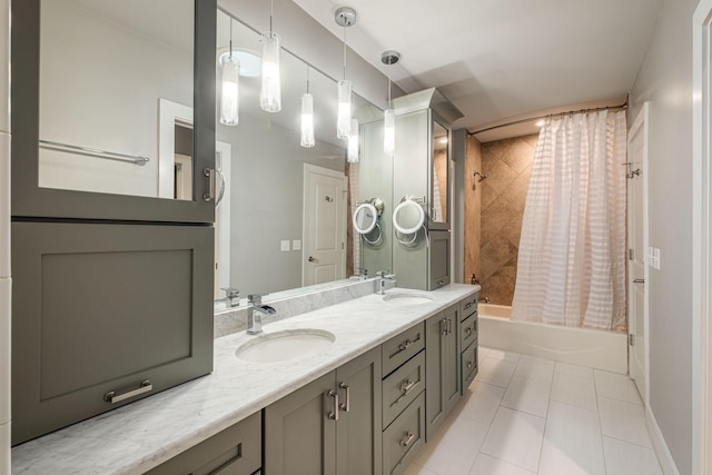 bathroom with tile patterned flooring, vanity, and shower / bath combo with shower curtain