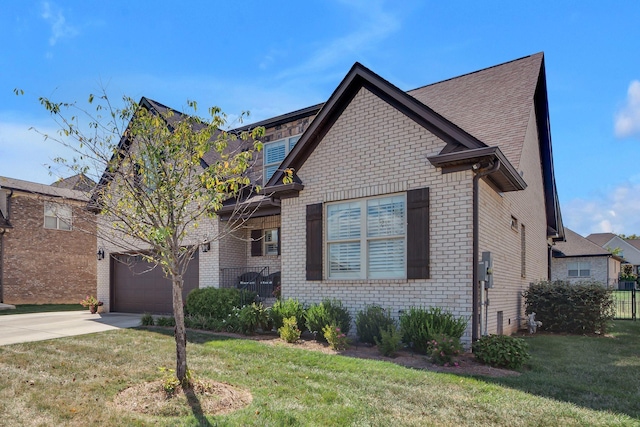 view of front of house with a front lawn and a garage