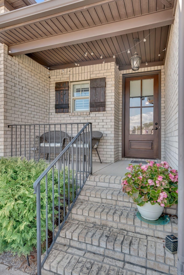 doorway to property with a porch