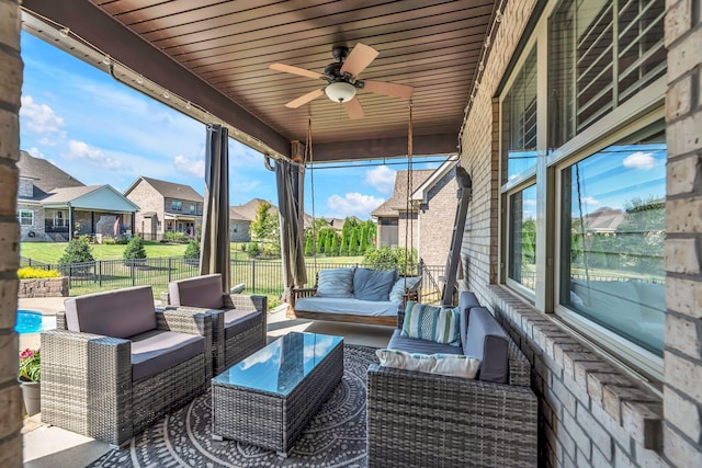 view of patio featuring an outdoor hangout area and ceiling fan