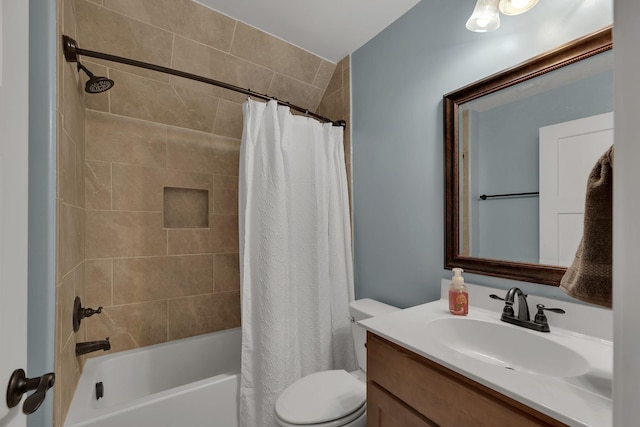 full bathroom featuring shower / tub combo, vanity, and toilet