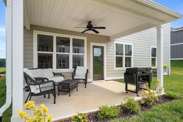 view of patio featuring an outdoor living space, area for grilling, and ceiling fan