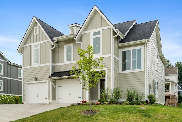 view of front facade with a front lawn and a garage