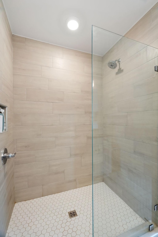 bathroom featuring walk in shower