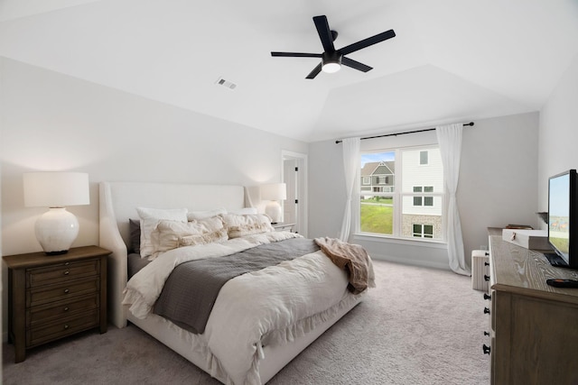 bedroom featuring light colored carpet and ceiling fan