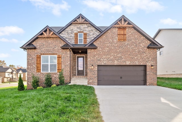 view of front of property with a front yard and a garage