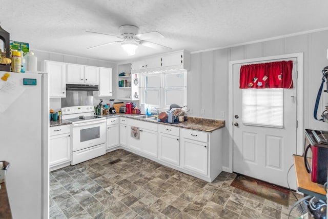 kitchen featuring a textured ceiling, white appliances, white cabinetry, and ceiling fan