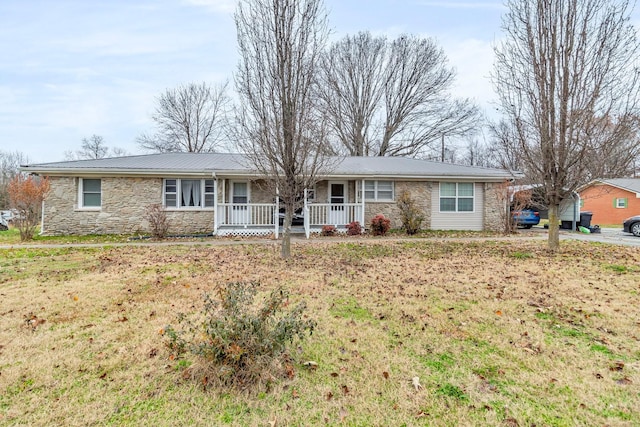 ranch-style home featuring covered porch