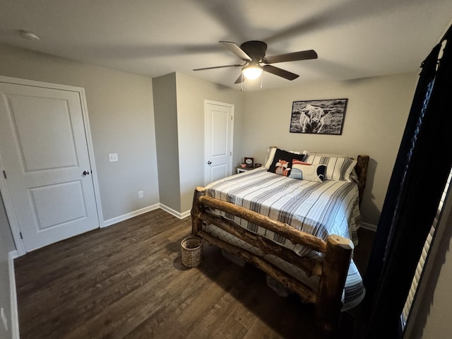 bedroom featuring ceiling fan and dark hardwood / wood-style floors