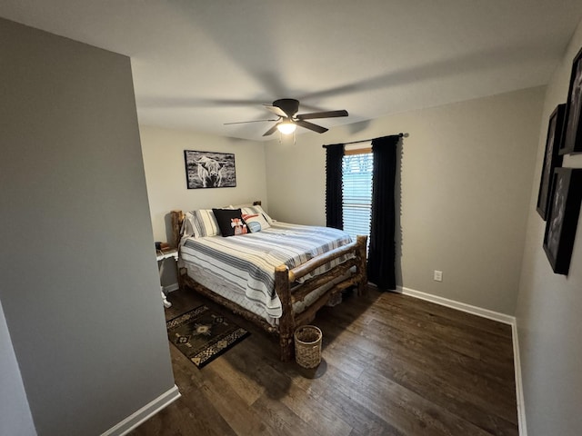 bedroom with ceiling fan and dark hardwood / wood-style floors