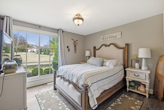 bedroom featuring hardwood / wood-style flooring