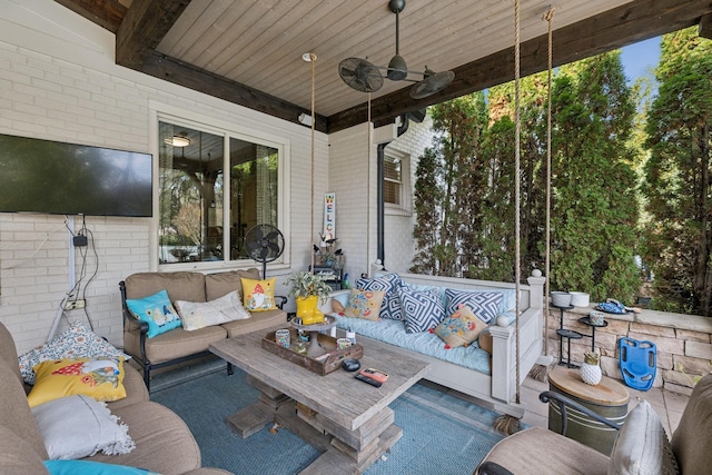 view of patio with an outdoor hangout area and ceiling fan