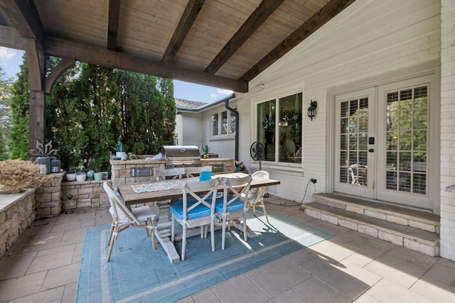 view of patio / terrace with a grill and french doors