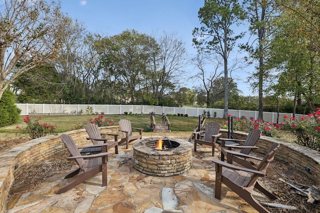 view of patio / terrace with an outdoor fire pit