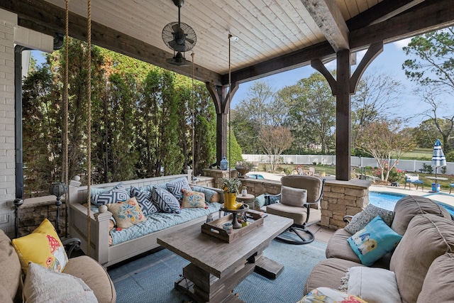 view of patio featuring a fenced in pool and an outdoor living space