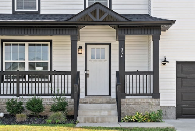 doorway to property featuring a porch