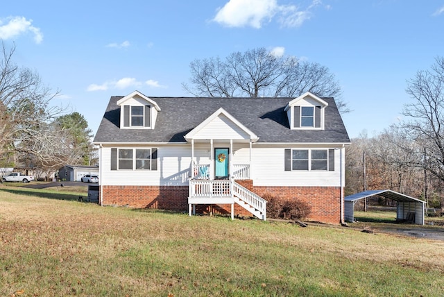 new england style home with a front yard and a carport