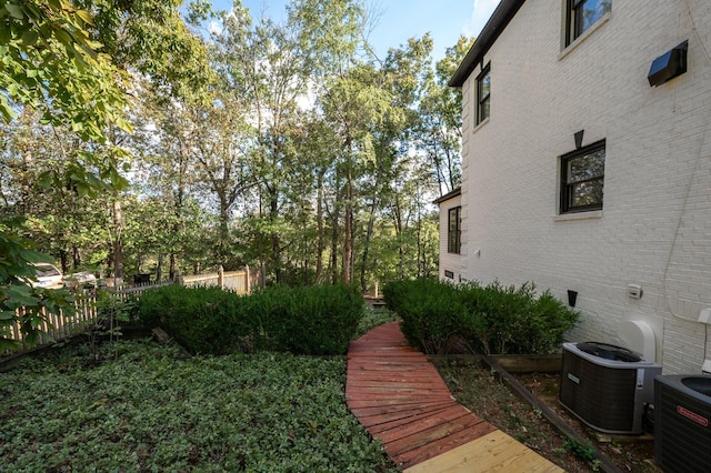 view of yard featuring central AC