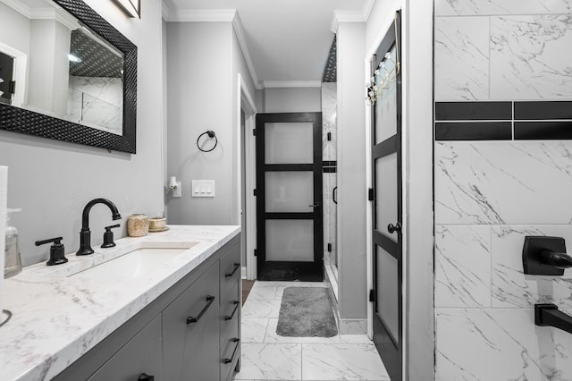 bathroom featuring vanity, a shower, and crown molding