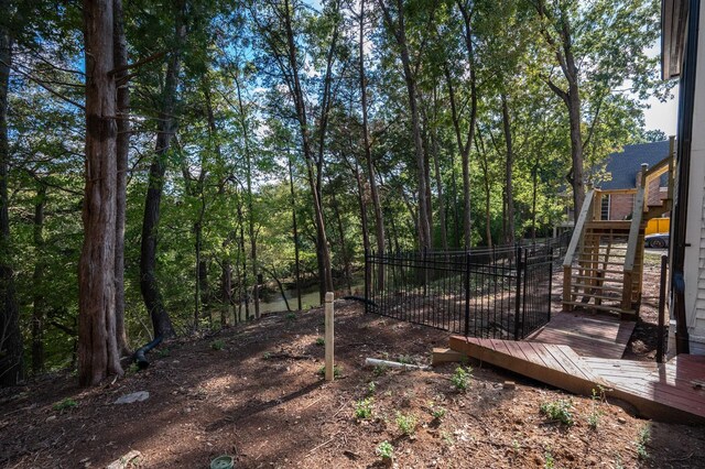 view of yard with a wooden deck