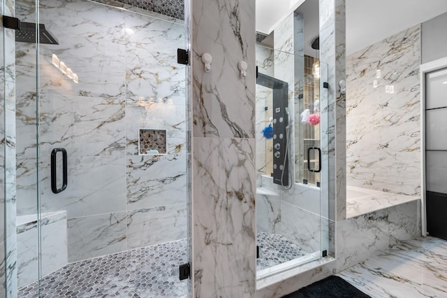 bathroom featuring an enclosed shower