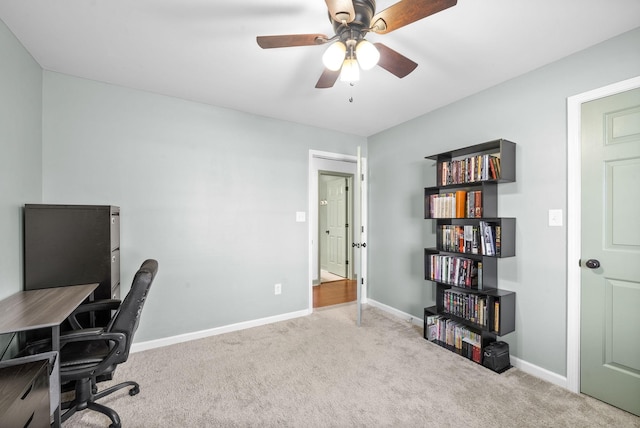 office featuring ceiling fan and carpet