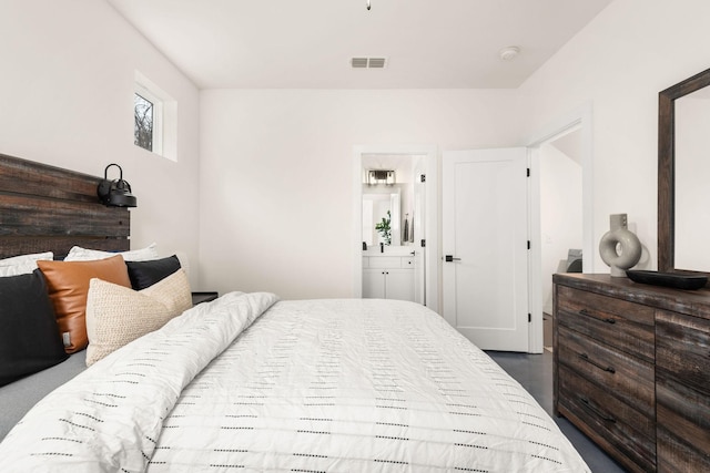 bedroom featuring ensuite bathroom