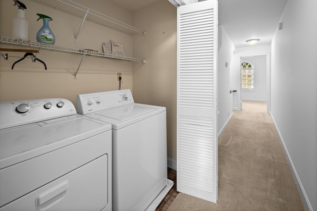 laundry room featuring carpet flooring and independent washer and dryer