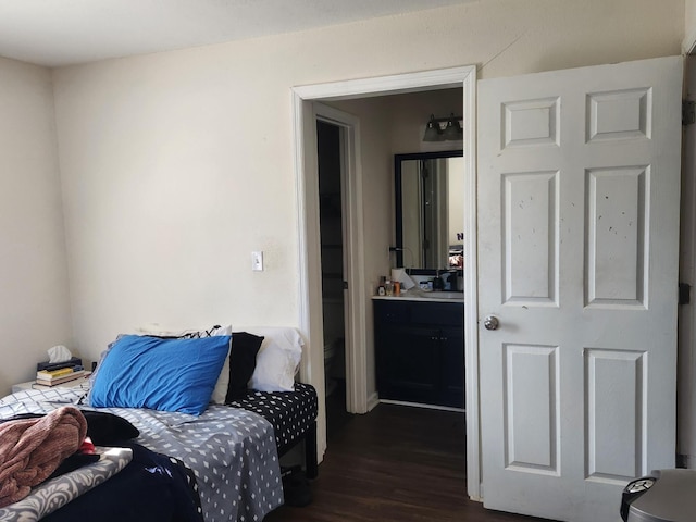 bedroom featuring dark wood-type flooring