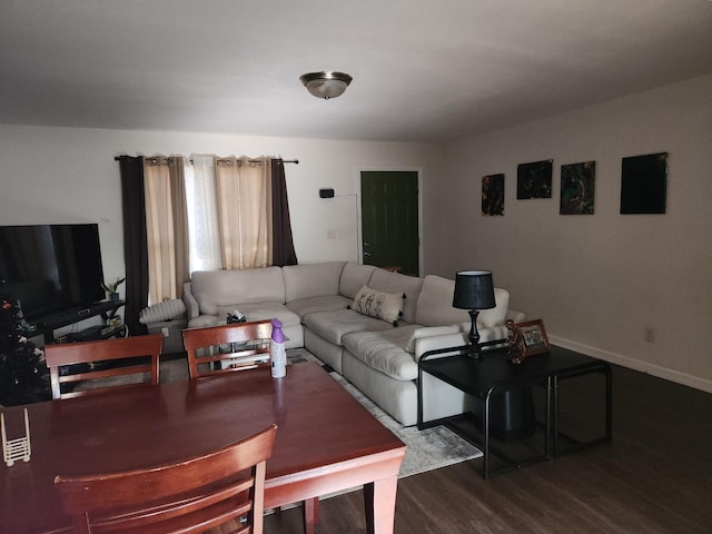 living room featuring dark hardwood / wood-style flooring