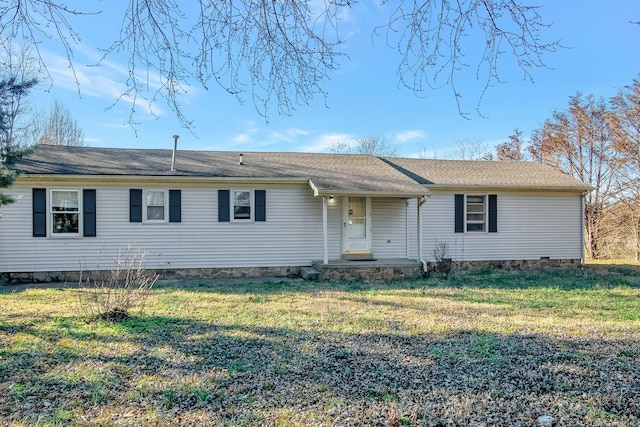 ranch-style house featuring a front lawn