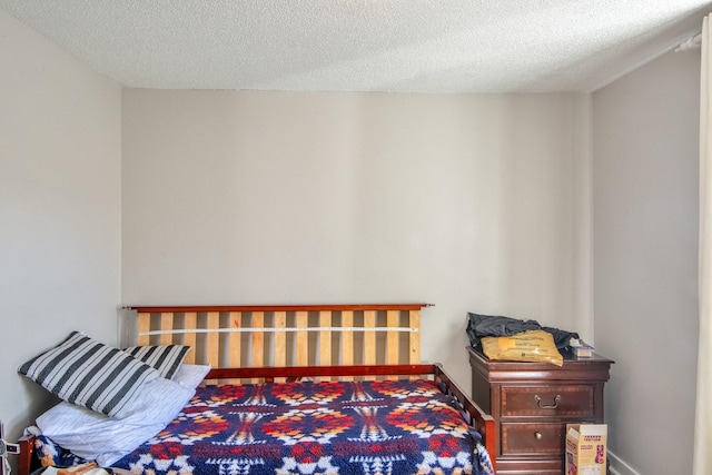 bedroom with a textured ceiling