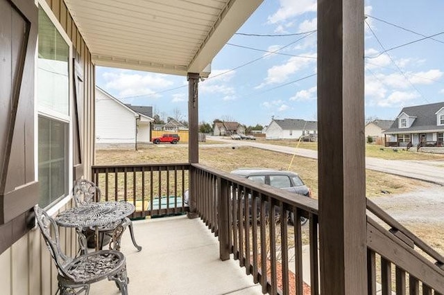 wooden terrace with covered porch