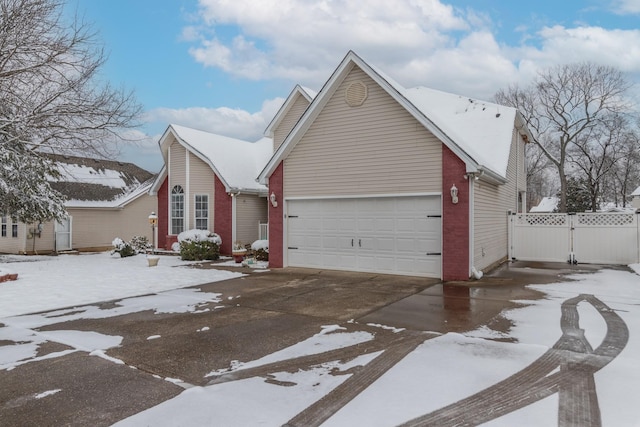 view of front of property with a garage