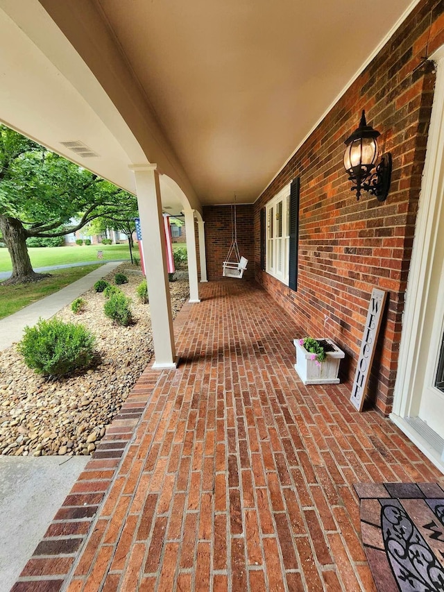 view of patio featuring covered porch