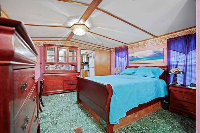 bedroom with ceiling fan and vaulted ceiling