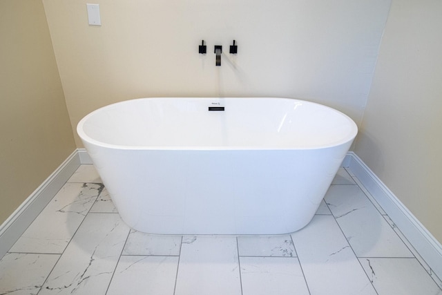 bathroom featuring a washtub