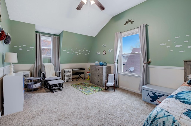 bedroom featuring ceiling fan, carpet floors, and lofted ceiling