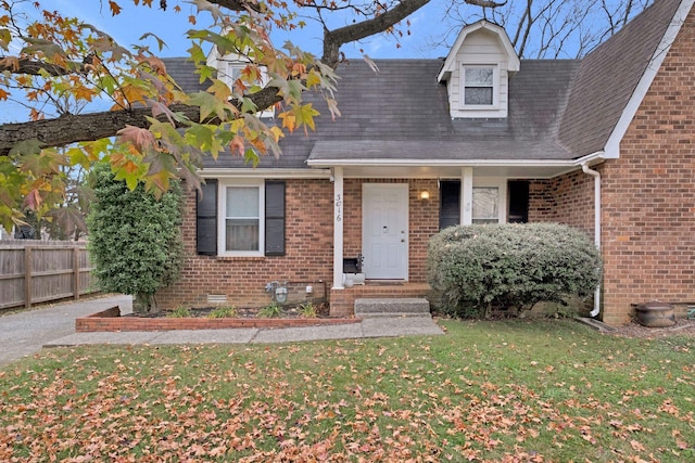 view of front of house with a front lawn