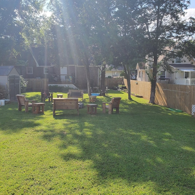 view of yard with a deck