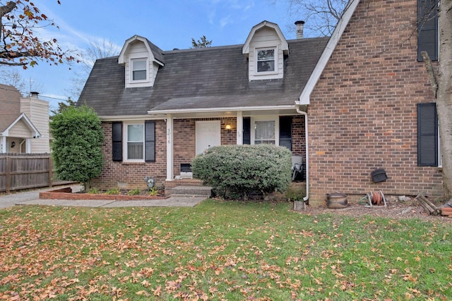 view of front of property featuring a front yard