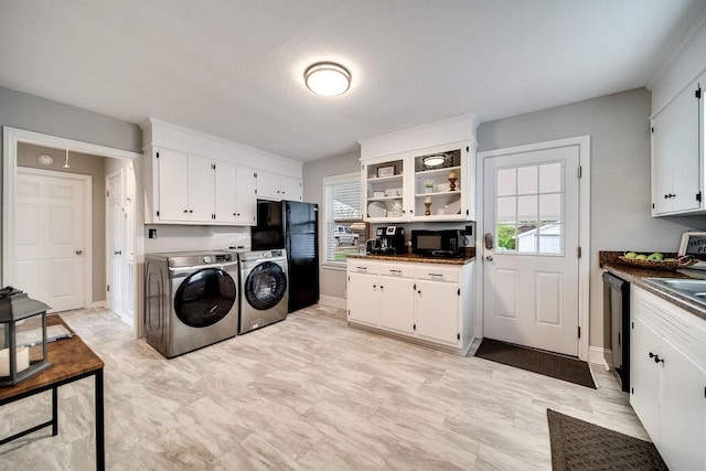 laundry room featuring washer and dryer and sink