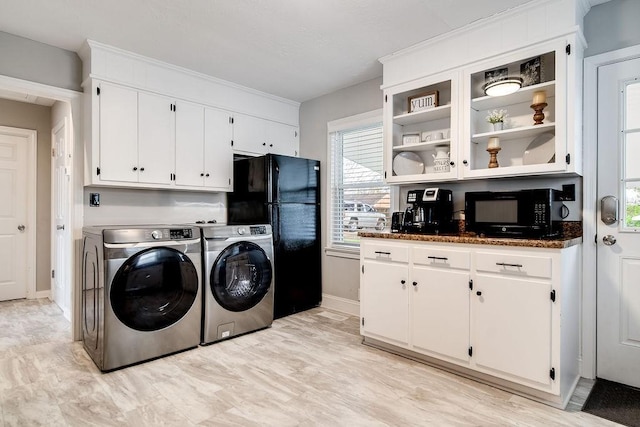 laundry area featuring independent washer and dryer