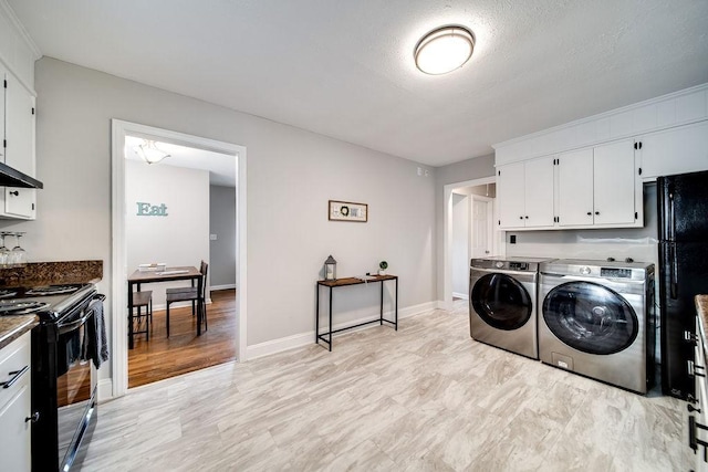 laundry area with separate washer and dryer