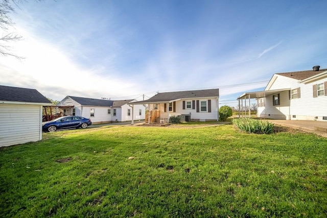 single story home with a front yard