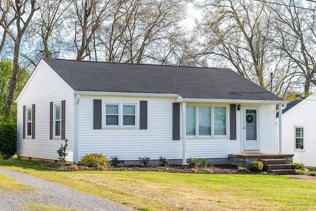 view of front of home with a front lawn