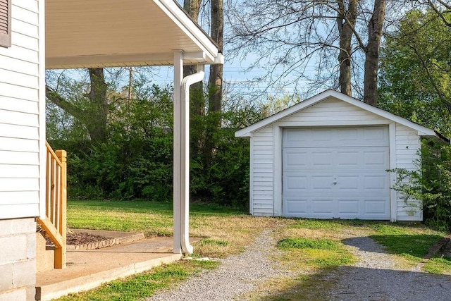 garage with a lawn