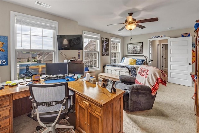 carpeted bedroom featuring ceiling fan