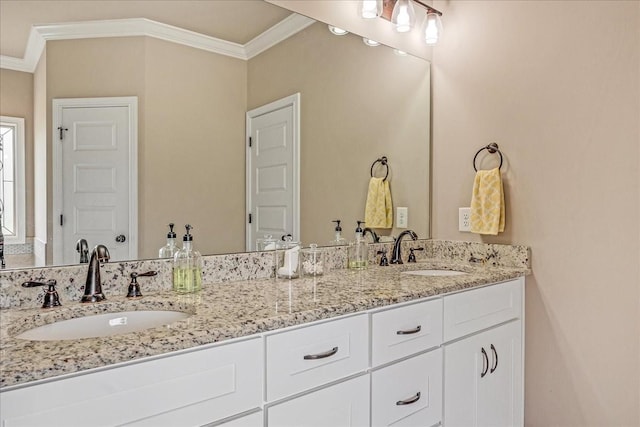 bathroom featuring vanity and ornamental molding